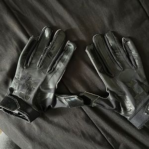 Used Black under Armour football gloves